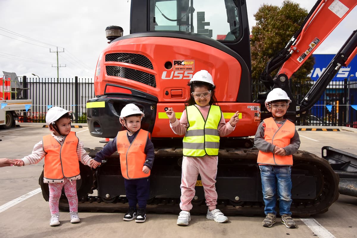 Diggers drive up to thank Deer Park children for their patience during level crossing work