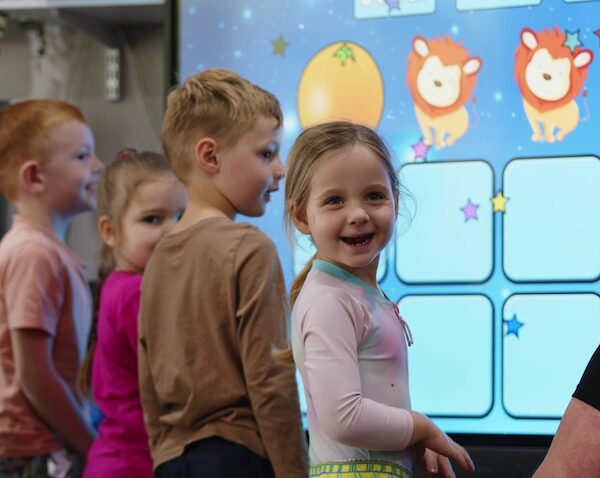 Children playing with BenQ board